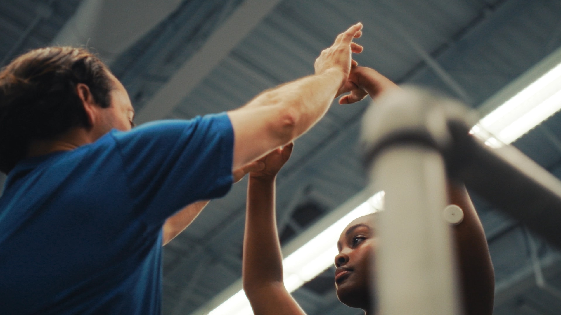 Instructor guiding a dancer during Grand Rapids Ballet Summer Intensives
