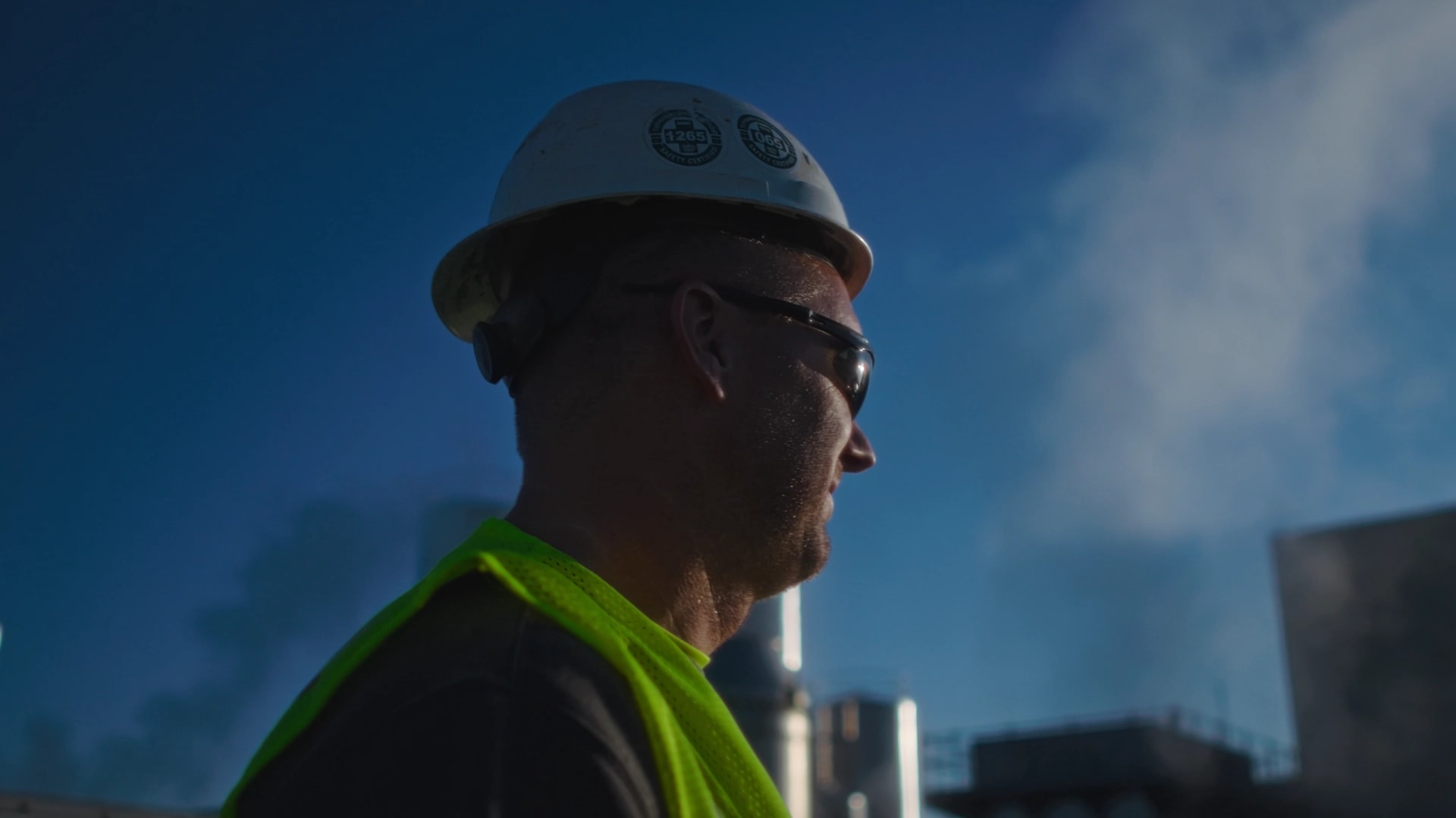 Van Dyken Mechanical team member stands inside a bright unfinished industrial space during the Life Doesn't Wait recruitment campaign in Grandville, Michigan.